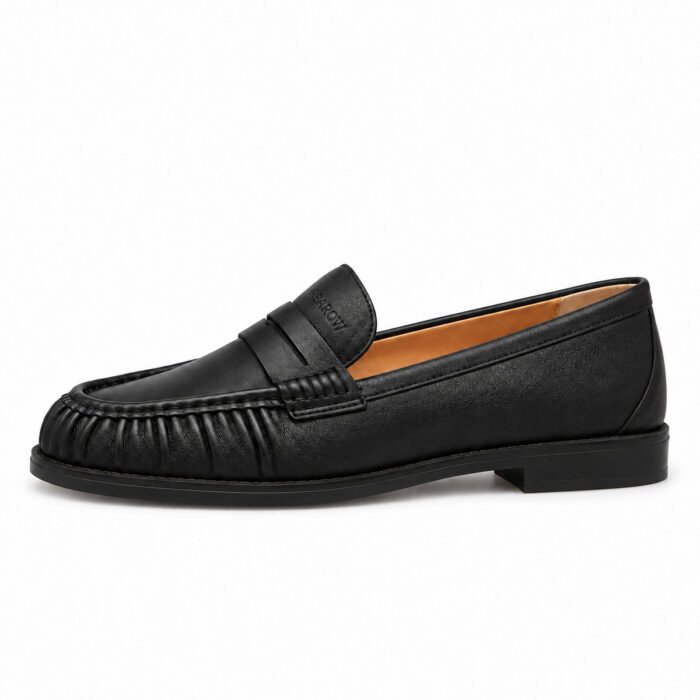 Mocassino arricciato in nappa con suola rialzata, nero – Rearow – Mocassino arricciato in nappa nera con suola rialzata di profilo dal lato esterno, con la linea di tomaia, suola e tacco